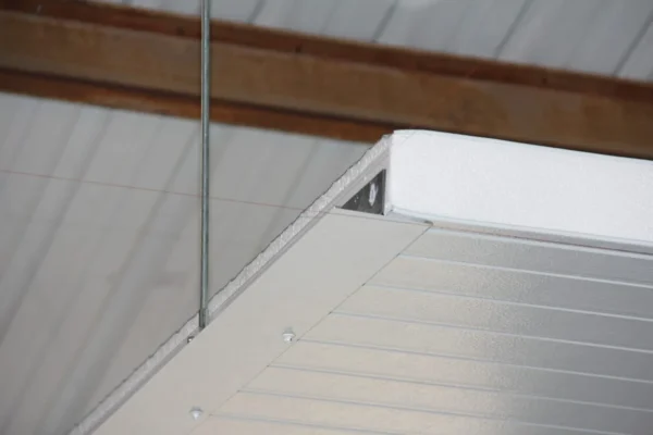 Ceiling insulated panel edge and support detail